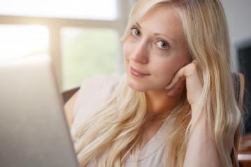 Blond woman with laptop : Stock Photo or Stock Video Download rcfotostock photos, images and assets rcfotostock | RC-Photo-Stock.: