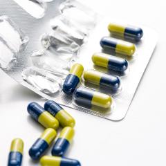 Blue and yellow Tablets capsule therapy flu in a Blister packaging antibiotic pharmacy medicine medical- Stock Photo or Stock Video of rcfotostock | RC-Photo-Stock