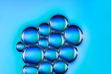 Blue bubbels in a petri dish at the laboratory- Stock Photo or Stock Video of rcfotostock | RC-Photo-Stock