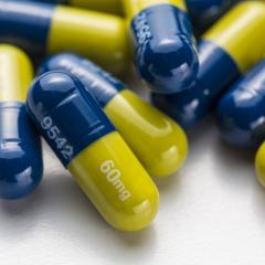 Blue yellow capsules therapy pills flu doctor antibiotic pharmacy medicine medical- Stock Photo or Stock Video of rcfotostock | RC-Photo-Stock
