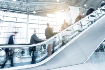 Blurred  business people using a skywalk/staircase- Stock Photo or Stock Video of rcfotostock | RC-Photo-Stock