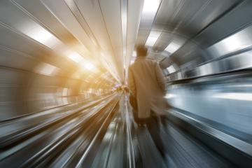 blurred business passengers on a walkway- Stock Photo or Stock Video of rcfotostock | RC Photo Stock