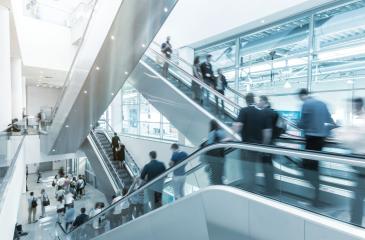 Blurred business people at a escalator- Stock Photo or Stock Video of rcfotostock | RC Photo Stock