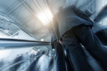 Blurred business people at a escalator- Stock Photo or Stock Video of rcfotostock | RC Photo Stock