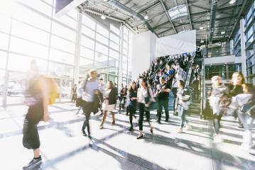 blurred business people at a trade fair : Stock Photo or Stock Video Download rcfotostock photos, images and assets rcfotostock | RC Photo Stock.: