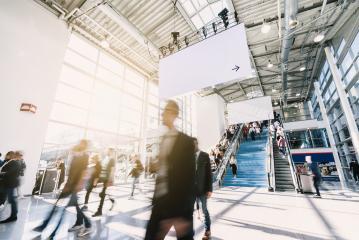 blurred business people at a trade fair- Stock Photo or Stock Video of rcfotostock | RC Photo Stock