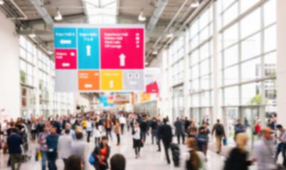 blurred business people at a trade fair hall- Stock Photo or Stock Video of rcfotostock | RC-Photo-Stock