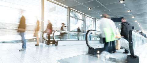blurred commuters walking on a escalator- Stock Photo or Stock Video of rcfotostock | RC Photo Stock