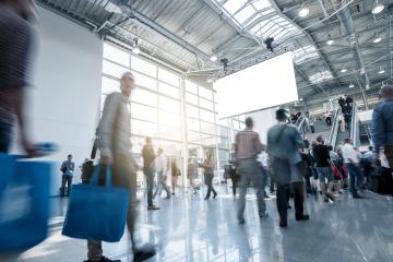 blurred people walking in a modern hall of a European Trade Fair- Stock Photo or Stock Video of rcfotostock | RC-Photo-Stock