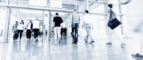 blurred visitors walking at trade fair hall- Stock Photo or Stock Video of rcfotostock | RC-Photo-Stock