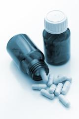 Bottle with vitamin capsules - Stock Photo or Stock Video of rcfotostock | RC Photo Stock
