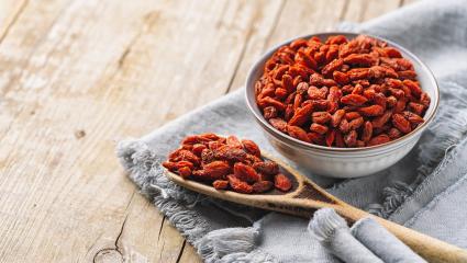 bowl with goji berries and spoon on the table- Stock Photo or Stock Video of rcfotostock | RC-Photo-Stock