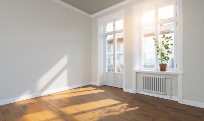 Bright empty room in old building apartment with balcony and parquet with bright sunlight - Stock Photo or Stock Video of rcfotostock | RC Photo Stock