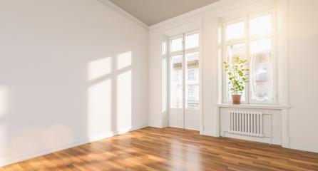 Bright old building with white walls and a balcony door next to the window at a sunny day- Stock Photo or Stock Video of rcfotostock | RC Photo Stock