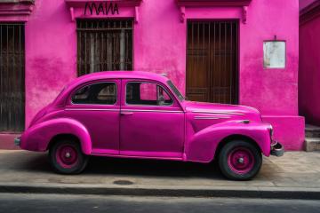 Bright pink vintage car parked in front of a matching pink building- Stock Photo or Stock Video of rcfotostock | RC Photo Stock