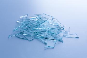 Broken window glas heap on blue gray background- Stock Photo or Stock Video of rcfotostock | RC-Photo-Stock