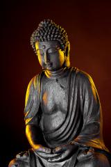 Buddha statue with glow against black background- Stock Photo or Stock Video of rcfotostock | RC Photo Stock