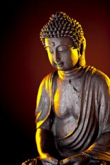 Buddha statue with glow against black background- Stock Photo or Stock Video of rcfotostock | RC-Photo-Stock