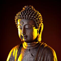 Buddha statue with glow against black background- Stock Photo or Stock Video of rcfotostock | RC Photo Stock