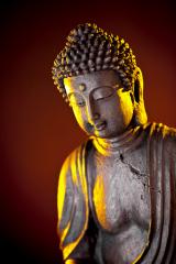 Buddha statue with glow against black background : Stock Photo or Stock Video Download rcfotostock photos, images and assets rcfotostock | RC-Photo-Stock.: