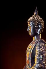 Buddha statue with glow against black background- Stock Photo or Stock Video of rcfotostock | RC-Photo-Stock