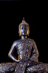 Buddha statue with glow against black background : Stock Photo or Stock Video Download rcfotostock photos, images and assets rcfotostock | RC Photo Stock.: