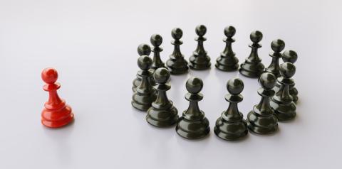 bullying concept, red pawn of chess, standing out from the crowd of blacks- Stock Photo or Stock Video of rcfotostock | RC Photo Stock