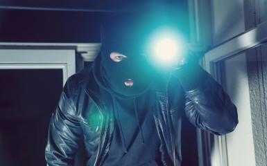 Burglar trying to break into a house with a flashlight- Stock Photo or Stock Video of rcfotostock | RC Photo Stock