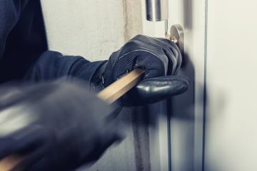 burglar using crowbar to break a home door at night- Stock Photo or Stock Video of rcfotostock | RC Photo Stock