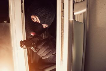 burglar using gun to break into a house- Stock Photo or Stock Video of rcfotostock | RC-Photo-Stock