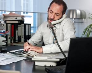 Businessman calculating finance : Stock Photo or Stock Video Download rcfotostock photos, images and assets rcfotostock | RC Photo Stock.: