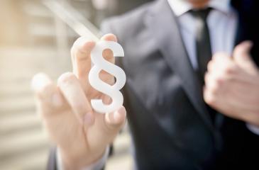 businessman holding paragraph symbol - law concept image : Stock Photo or Stock Video Download rcfotostock photos, images and assets rcfotostock | RC-Photo-Stock.: