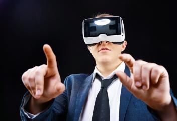 Businessman uses Virtual Realitiy VR head-mounted display- Stock Photo or Stock Video of rcfotostock | RC Photo Stock