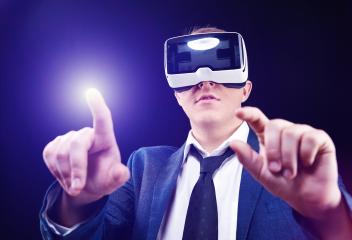 Businessman uses Virtual Realitiy VR head-mounted display- Stock Photo or Stock Video of rcfotostock | RC-Photo-Stock