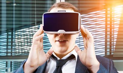 Businessman uses Virtual Reality VR head mounted display- Stock Photo or Stock Video of rcfotostock | RC-Photo-Stock