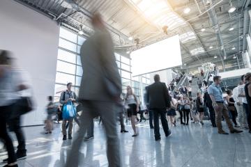 businesspeople walking International Trade Fair & Conference- Stock Photo or Stock Video of rcfotostock | RC Photo Stock