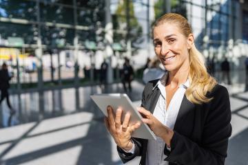 businesswoman at a trade show, with copy space for individual text- Stock Photo or Stock Video of rcfotostock | RC Photo Stock