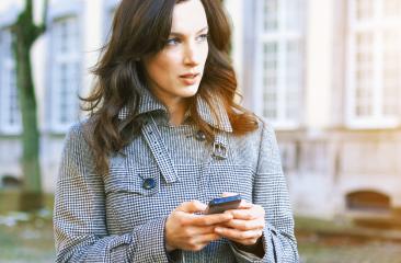 Businesswoman use her mobile phone- Stock Photo or Stock Video of rcfotostock | RC-Photo-Stock
