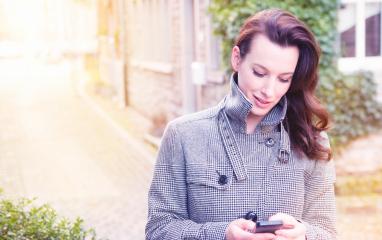 Businesswoman use her mobile phone- Stock Photo or Stock Video of rcfotostock | RC Photo Stock