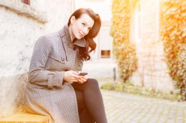 Businesswoman use her mobile phone- Stock Photo or Stock Video of rcfotostock | RC-Photo-Stock