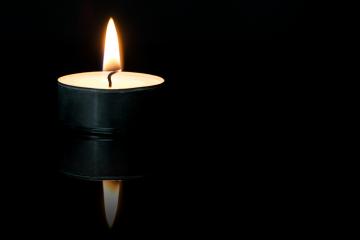 Candle Lit or Tealight is Burning on black background- Stock Photo or Stock Video of rcfotostock | RC Photo Stock