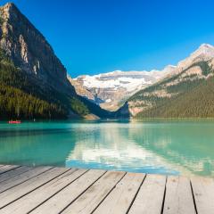 Canoeing at Lake Louise at the Rocky Mountains - Stock Photo or Stock Video of rcfotostock | RC Photo Stock