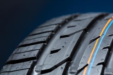 Car tire profil Close-up on blue background- Stock Photo or Stock Video of rcfotostock | RC-Photo-Stock