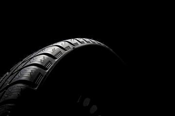 Car tires close-up Winter wheel profile structure on black background- Stock Photo or Stock Video of rcfotostock | RC Photo Stock