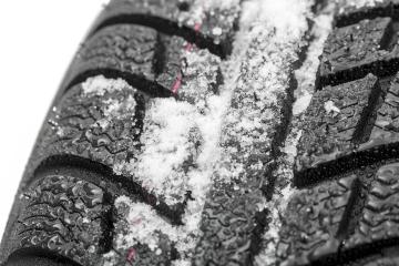 Car tires close-up Winter wheel profile structure with snow on white background- Stock Photo or Stock Video of rcfotostock | RC Photo Stock