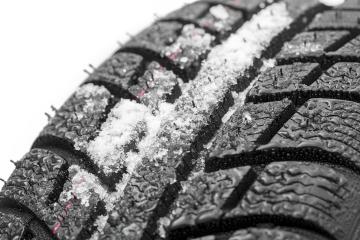 Car tires close-up Winter wheel profile structure with snow on white background- Stock Photo or Stock Video of rcfotostock | RC-Photo-Stock