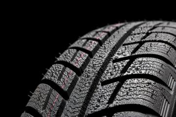 Car tires close-up Winter wheel profile structure with waterdrops on blue black background- Stock Photo or Stock Video of rcfotostock | RC-Photo-Stock