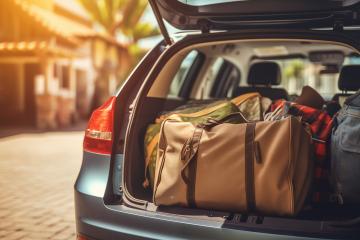 Car trunk loaded with bags and a blanket, ready for travel
 : Stock Photo or Stock Video Download rcfotostock photos, images and assets rcfotostock | RC Photo Stock.: