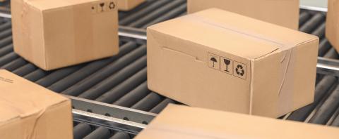 Cardboard boxes on a conveyor line, Delivery concept image- Stock Photo or Stock Video of rcfotostock | RC Photo Stock