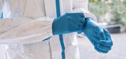 caregiver wearing a medical Latex gloves at work to prevent corona COVID-19 and SARS infection during coronavirus pandemic- Stock Photo or Stock Video of rcfotostock | RC Photo Stock